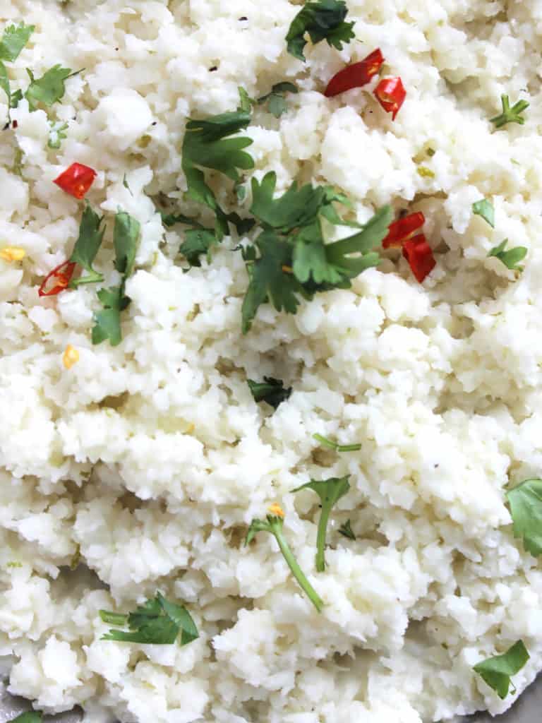 Close up of the cauliflower rice with fresh herbs