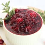 Close up of brown sugar cranberry sauce in a small serving pot.