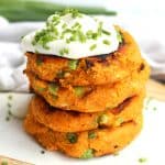 Four sweet potato cakes stacked on top of each other.