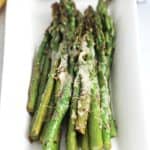 Close up of the melted parmesan on the sauteed asparagus.