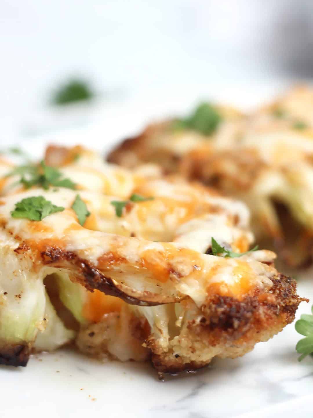 Cheesy Oven Roasted Cauliflower Steaks Bite On The Side