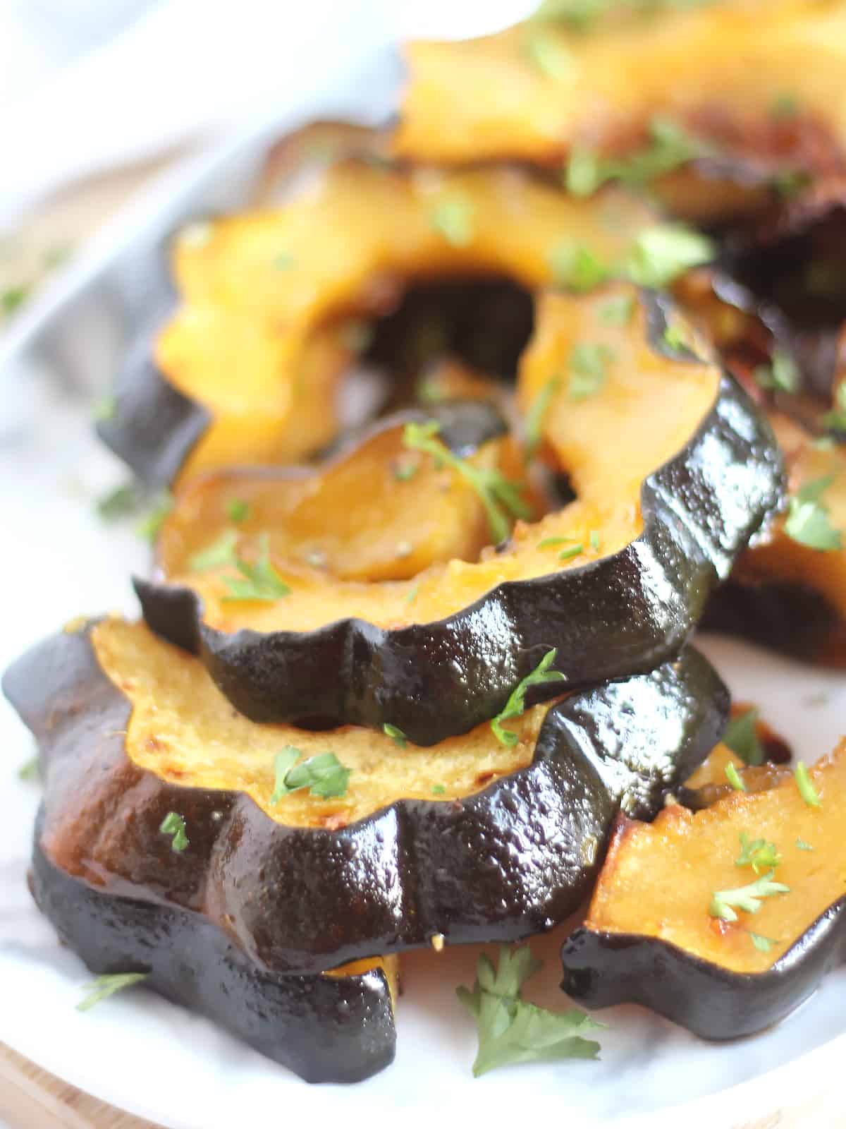 Close up of slices of roasted acorn squash.
