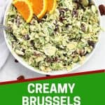 Pinterest graphic. Creamy Brussels sprout slaw with text overlay.