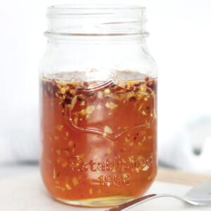 Homemade hot honey in a mason jar.