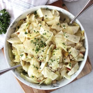 Air fried white cabbage with fresh parsley garnish.