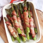 Bacon wrapped asparagus in a serving dish.