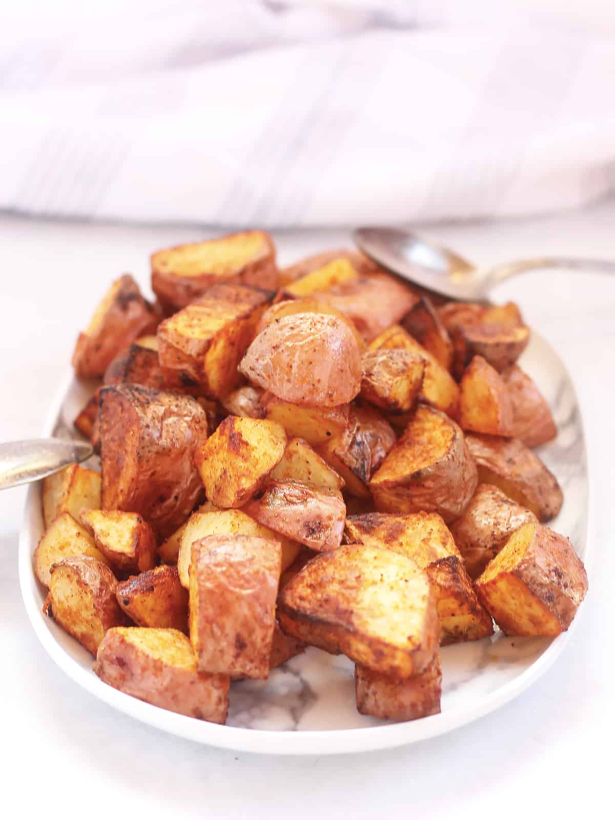 Roasted potatoes with skins on.