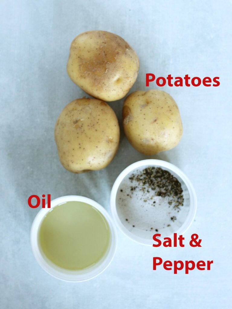 Ingredients needed to make the recipe; potatoes, oil and salt and pepper.