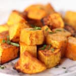 Roasted butternut squash cubes.