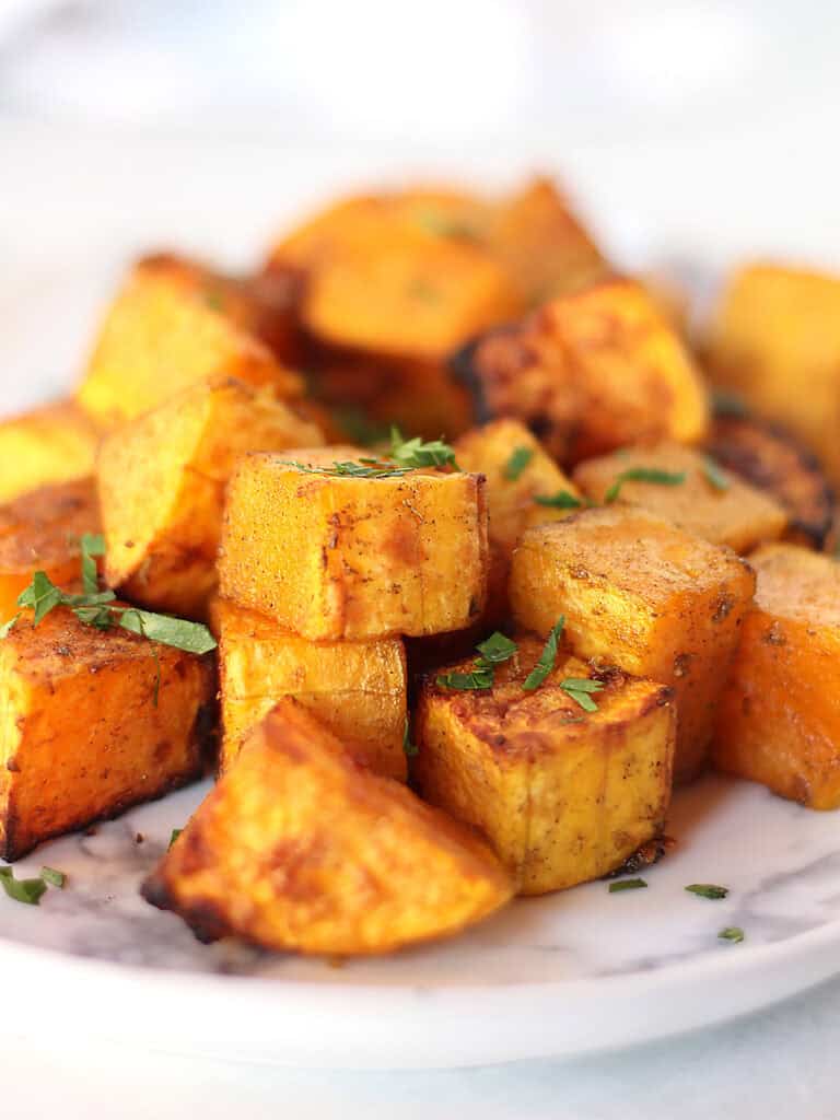 Roasted butternut squash cubes.