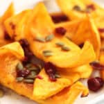 Pumpkin wedges with caramelized edges.