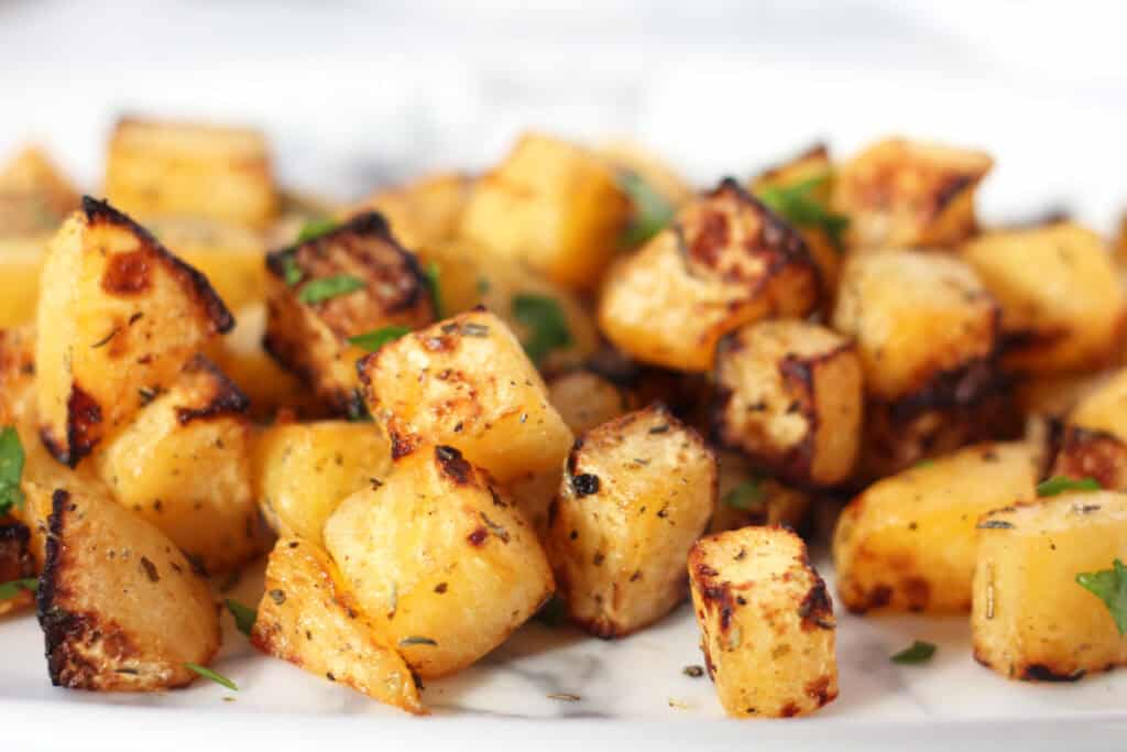 Seasoned rutabaga cubes ready to eat.