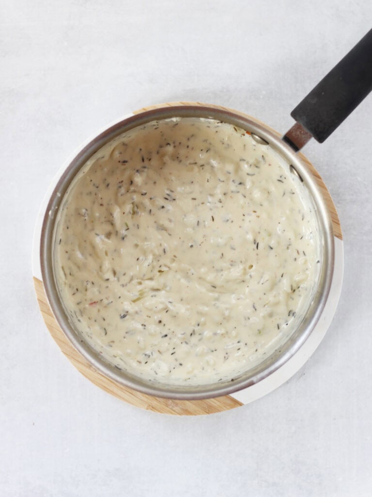 Cream sauce in a pot.
