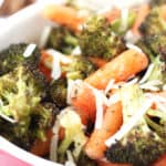Roasted baby carrots and broccoli topped with grated parmesan.