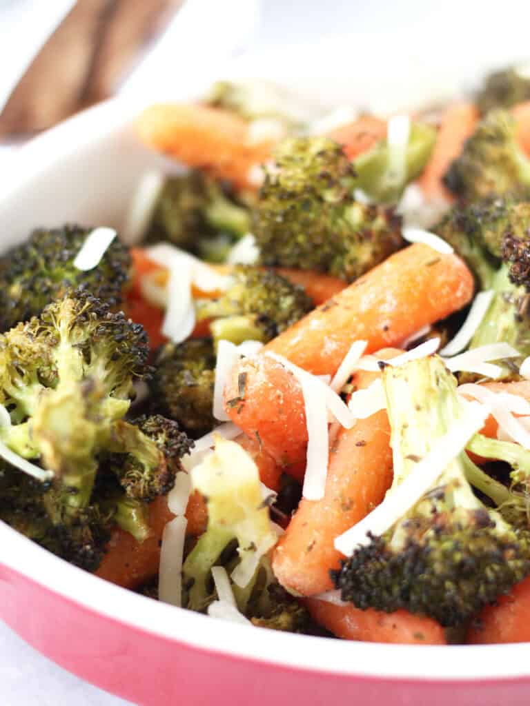 Roasted baby carrots and broccoli topped with grated parmesan.