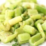 Seasoned celery served on a plate.