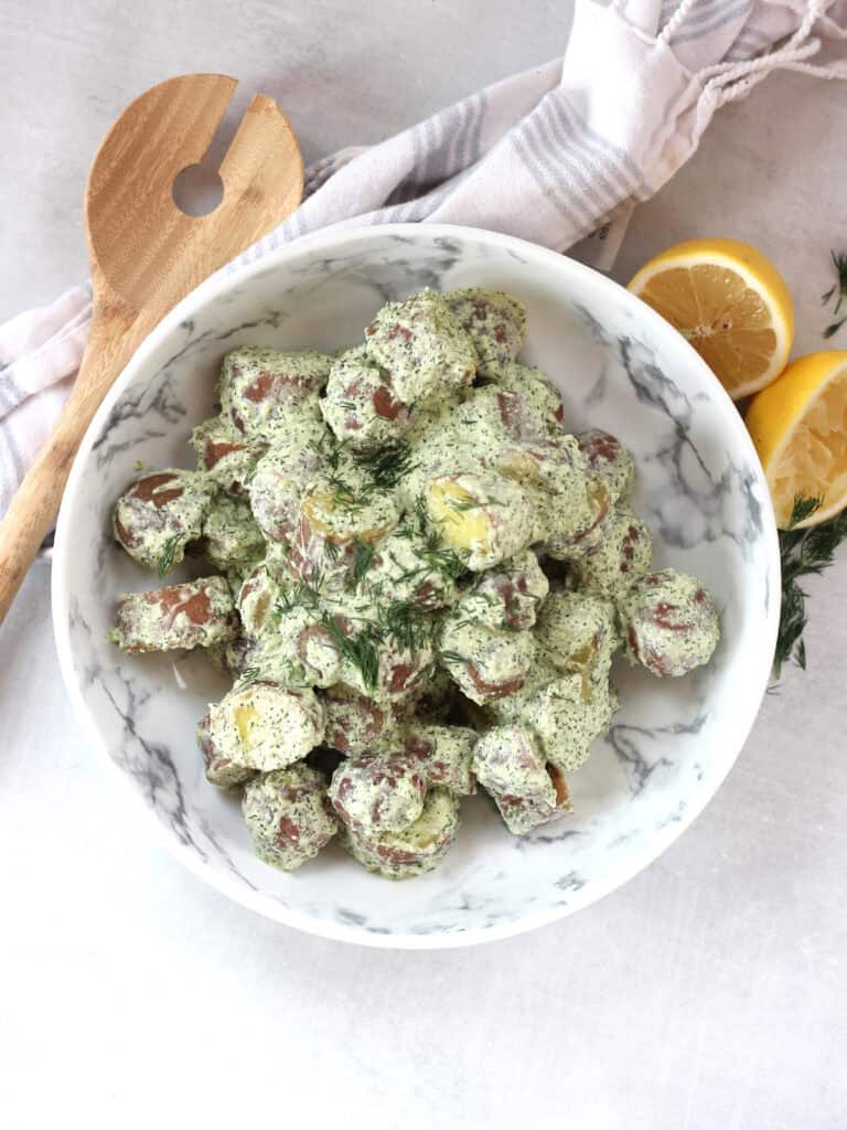 Potato salad with cottage cheese dressing served in a bowl.