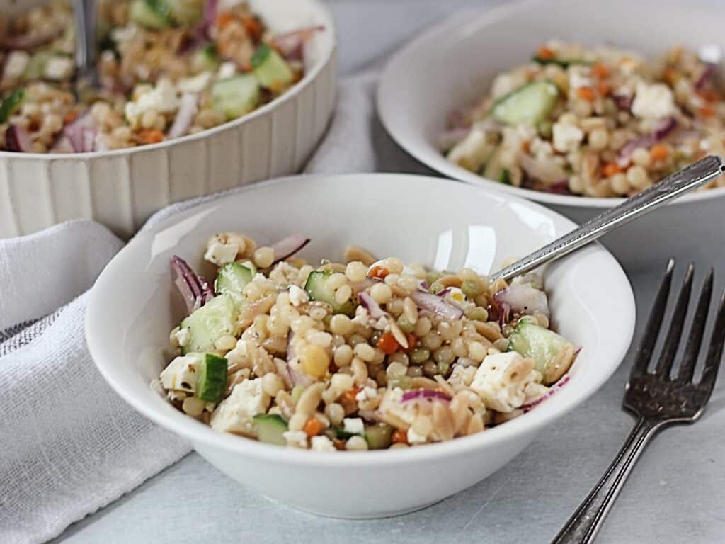 Couscous salad served into two small bowls.